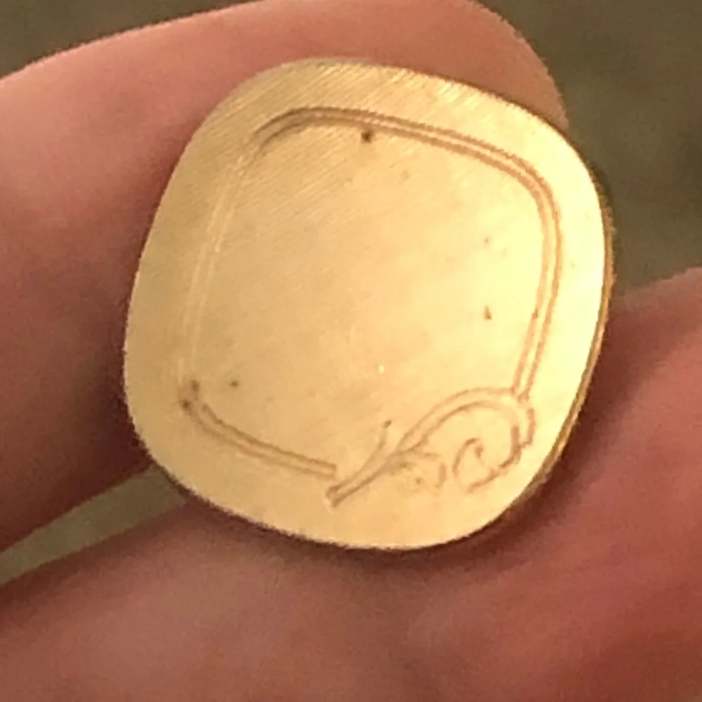 Vintage men’s Swank etched gold cuff links
